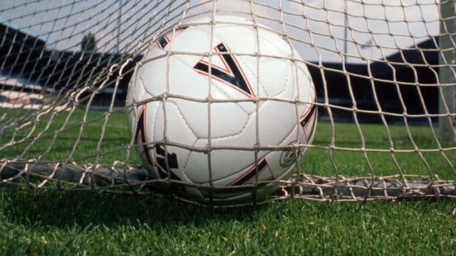 High-scoring action in primary school football competition