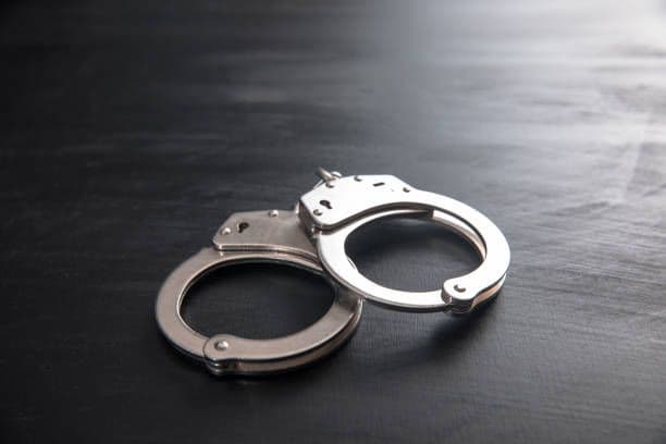 Five arrested as police seize gun and drugs