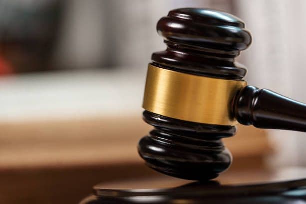Ex-municipal cop's case against Arima Corp to continue