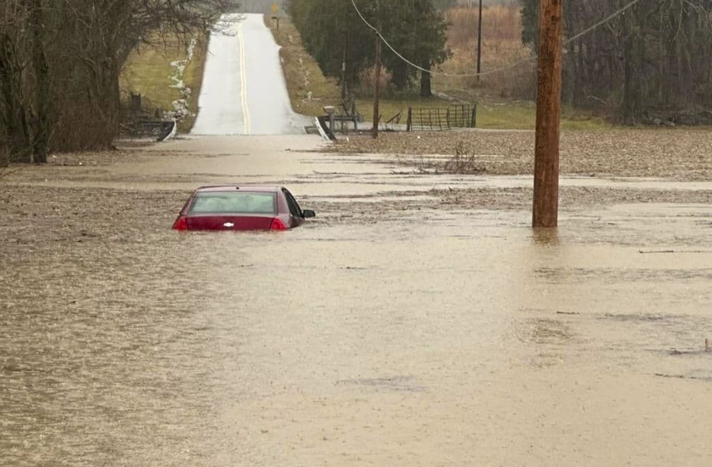 Flooding in US Southeast leaves 2 dead while snow, ice and wind cause winter misery elsewhere