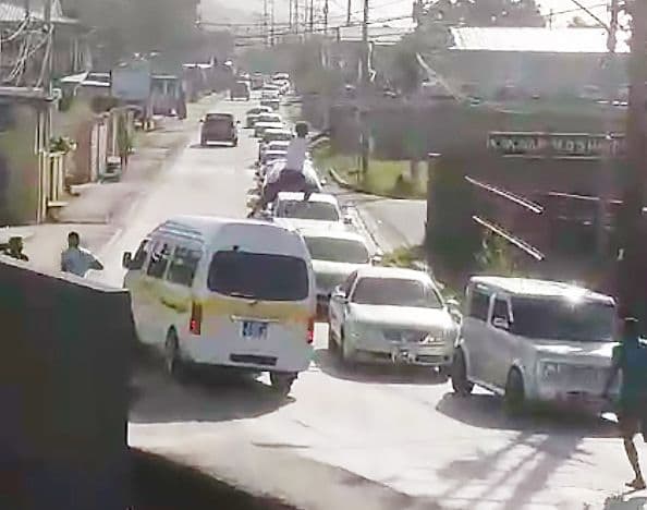 Man seen being chased and ‘surfing’ vehicles held