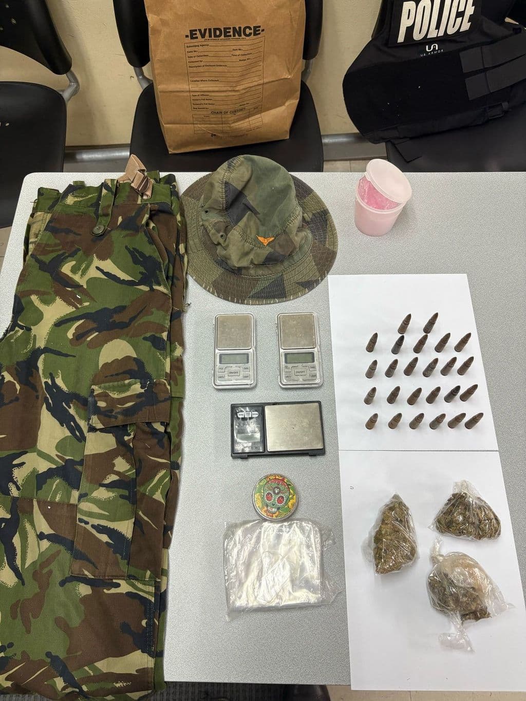 Police discover camouflage, cannabis, firearm