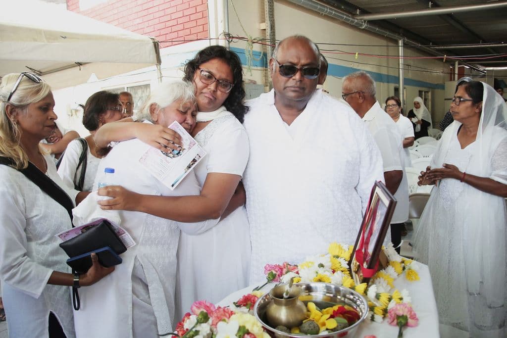 Emotional last rites for slain autistic teen