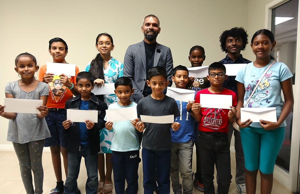 Chaguanas mayor distributes $75,000 in book grants