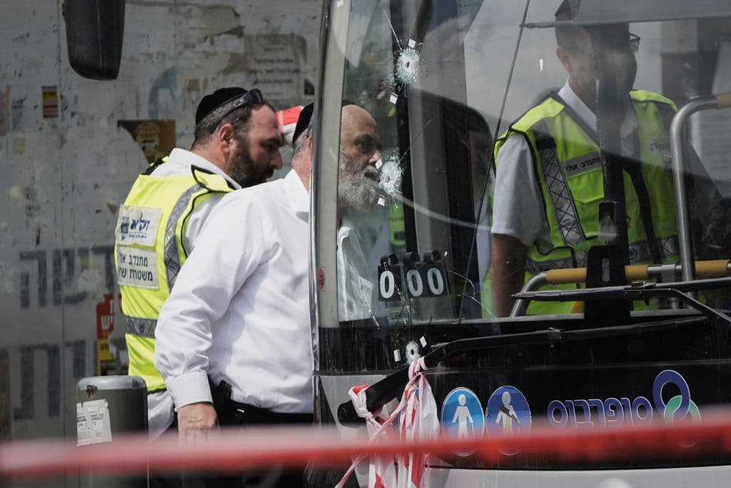Palestinian gunmen kill 6 people in attack on Jerusalem bus stop