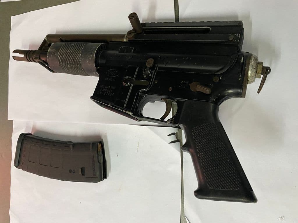 Rifle and ammunition seized in Nelson Street raid