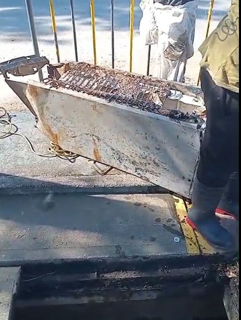 Refrigerator pulled from drain in Maraval