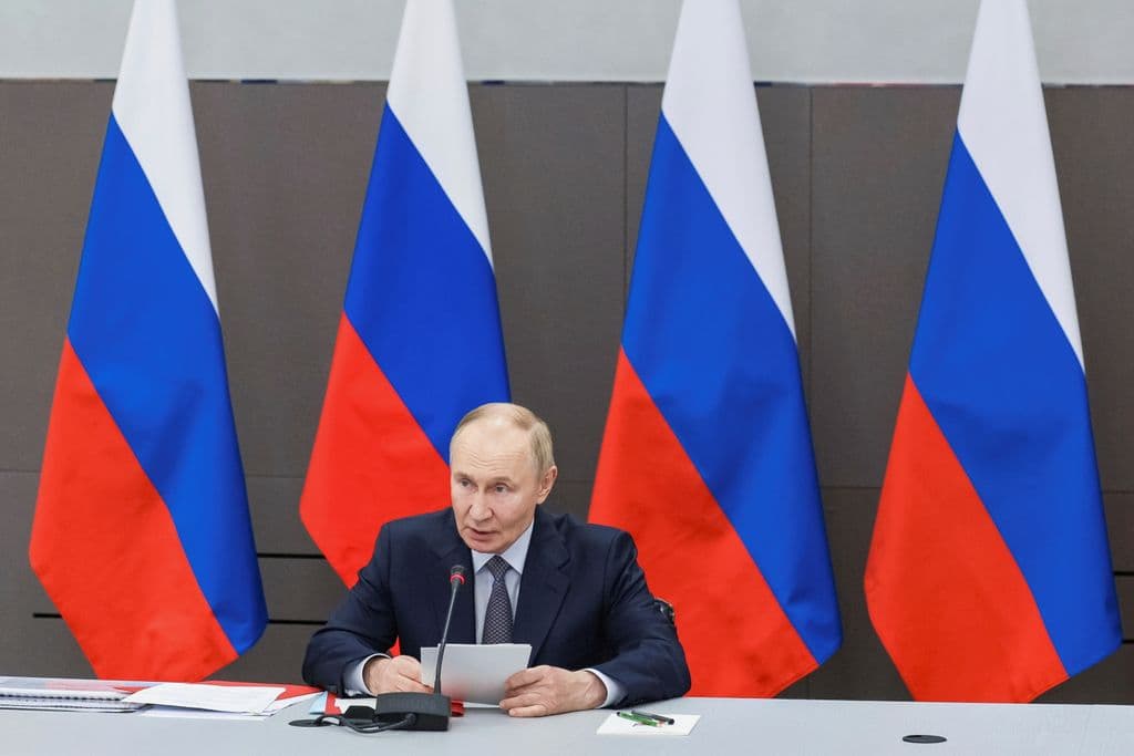 Putin says Russia will stick to nuclear arms limits for 1 more year