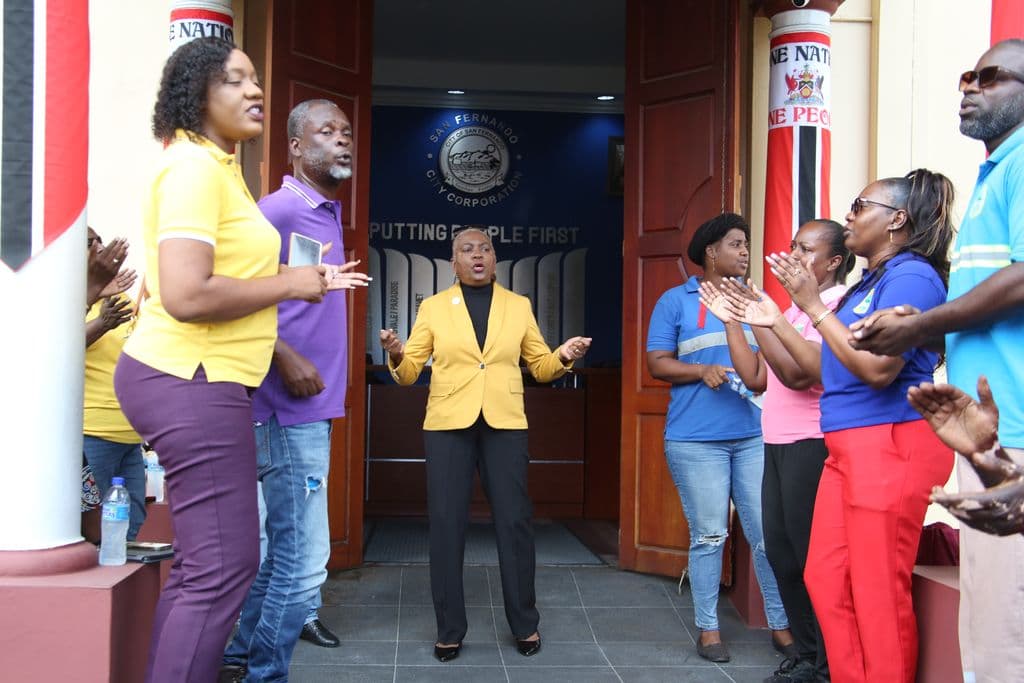 Workers paid after City Hall Protest but union still wary