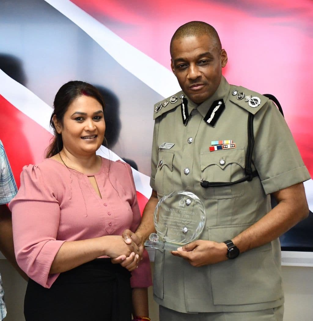 Kidnap victim thanks TTPS, presents CoP with plaque