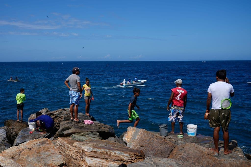 US-Venezuela tensions leave families, workers in limbo