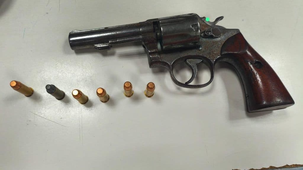 Man held with gun tells police: ‘I have it for protection’