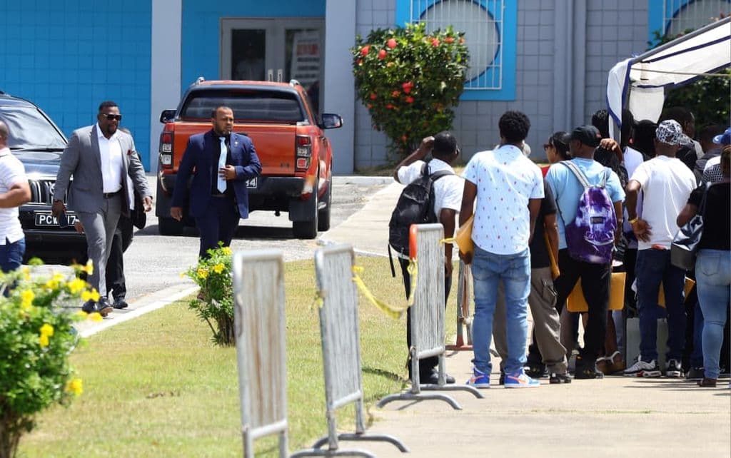 Migrants protest delays, failed registrations