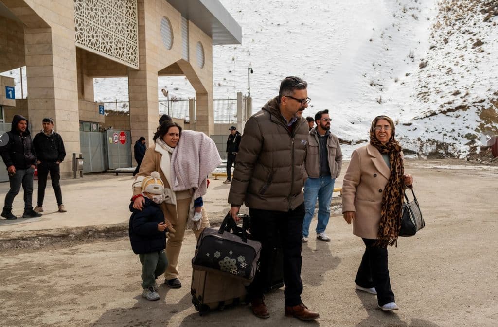 Iranians grapple with whether to flee the country