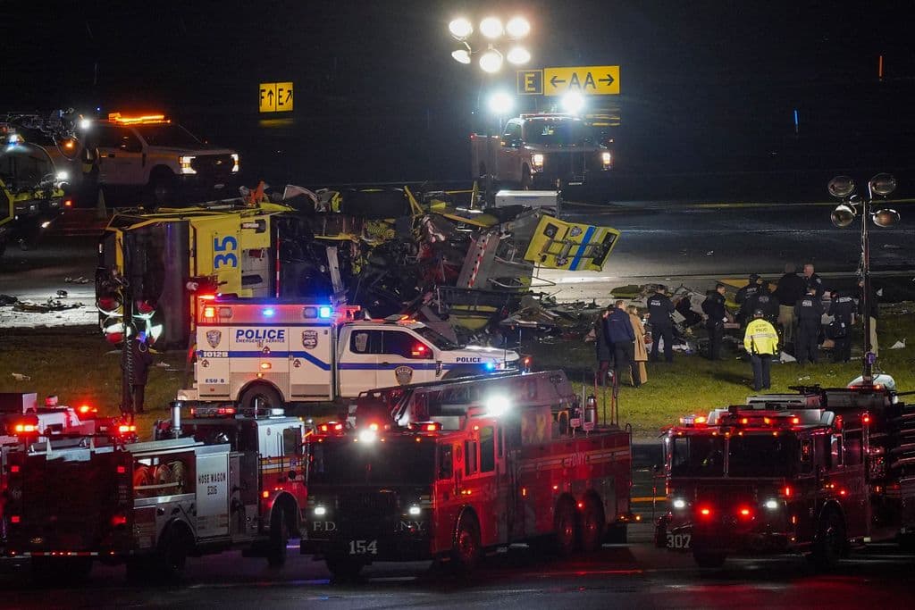 Pilot and copilot killed in collision between jet and fire truck at New York’s LaGuardia Airport