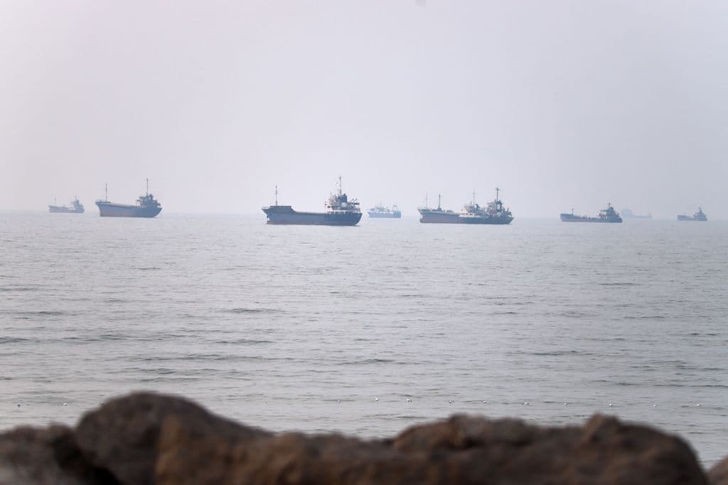 Three tankers hit in the Strait of Hormuz as US revokes license authorizing sale of Iranian oil
