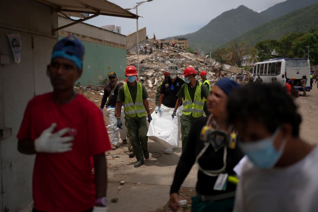A push to identify bodies as deaths multiply in Venezuela after twin earthquakes