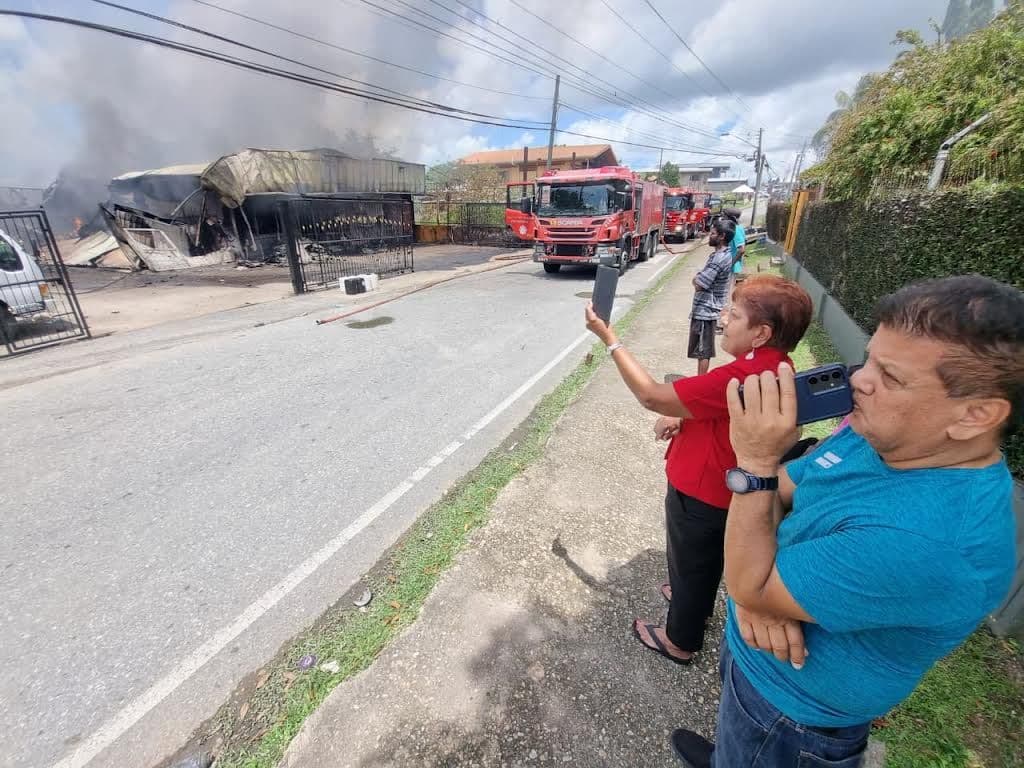 Fire destroys supermarket, leaves seven homeless