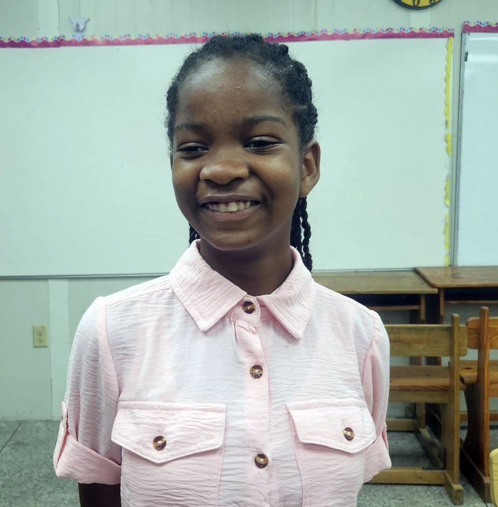 Faith refuses to let visual impairment define her