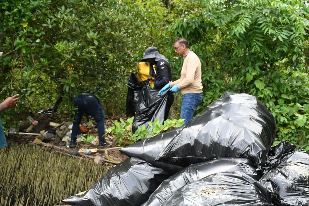 Volunteers remove 1,022 pounds of waste from Cunupia River mangroves