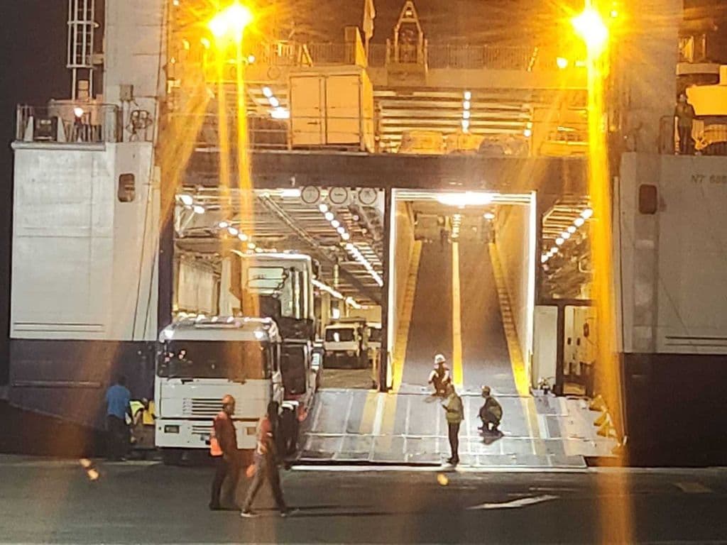 Runaway truck almost crushes woman