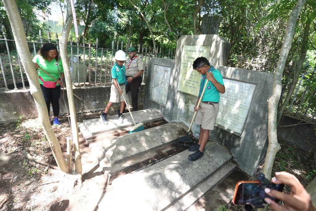 Scouts spend Emancipation Day cleaning Sir Lamont family graves