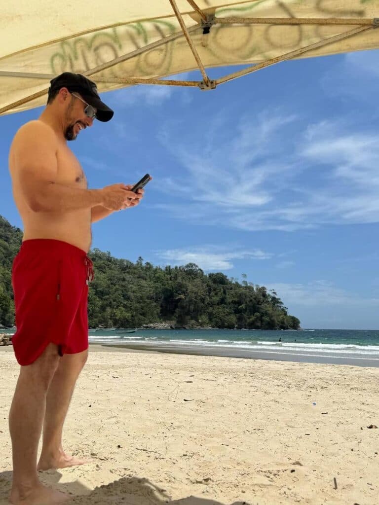 Shirtless Young sends love to Trinidad and Tobago from beach