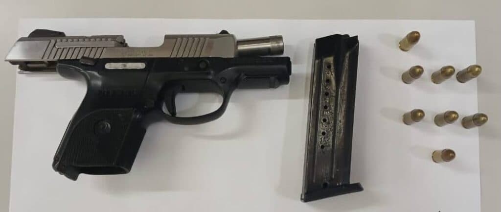 Two held, gun, ammo, drugs seized