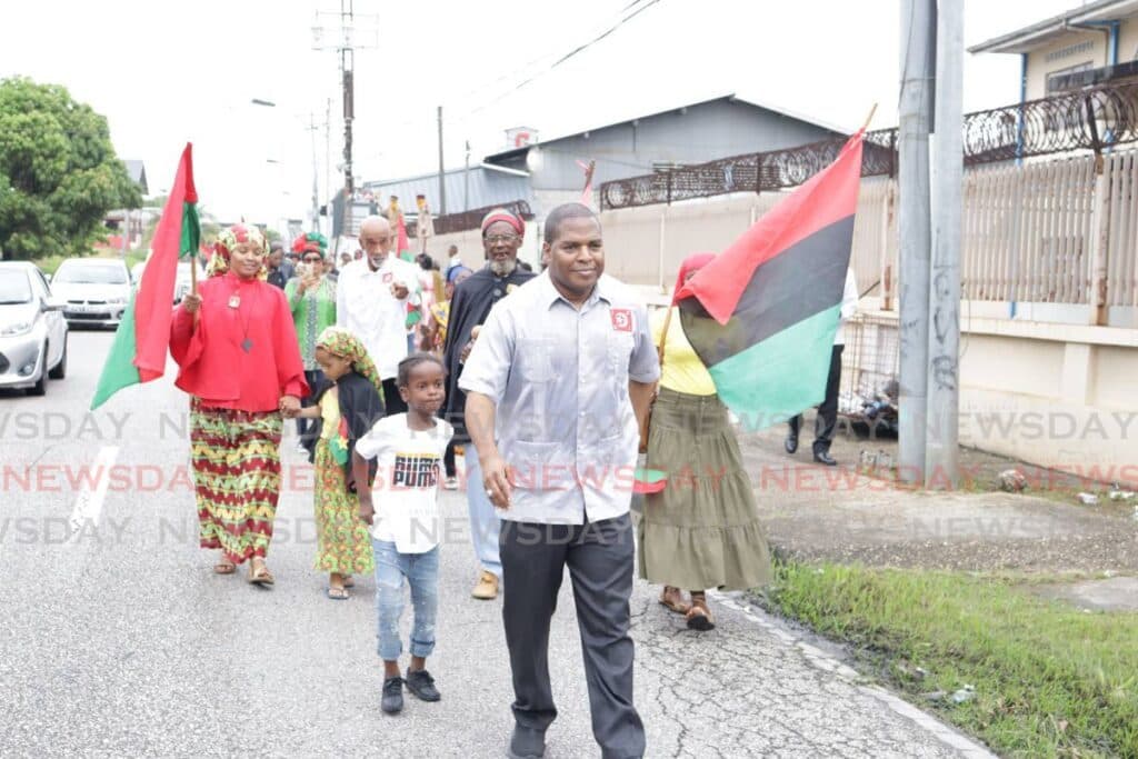 Trinidad and Tobago nationals march in support of Burkina Faso leader