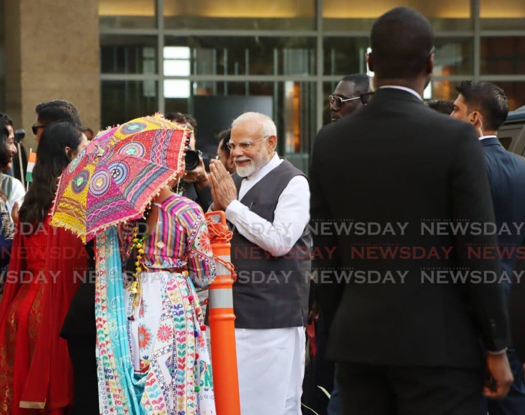 Indian flags flutter as Modi arrives at Hyatt