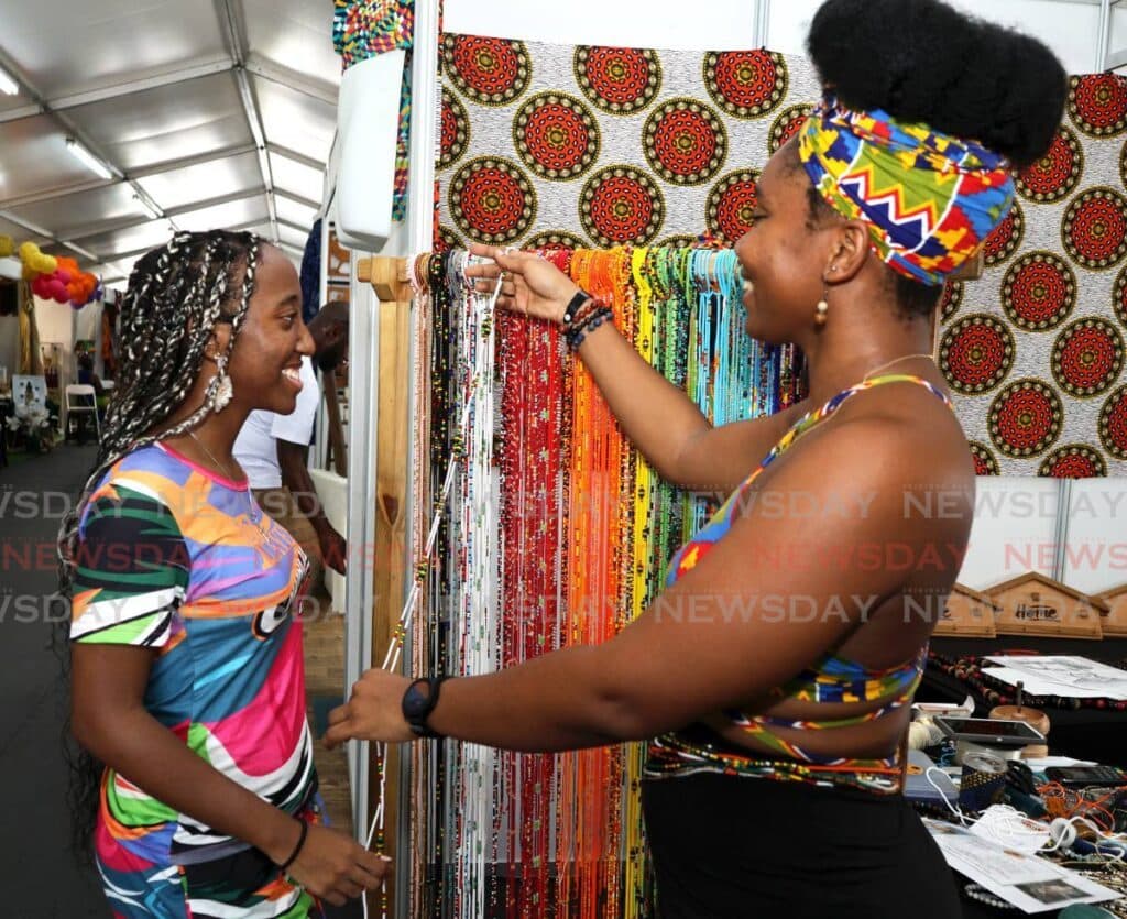 Emancipation Village vendors hopeful even as rain slows sales