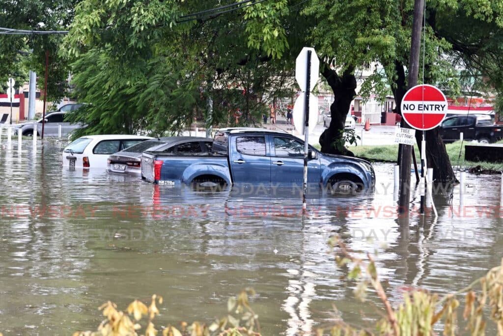 City under water: Afternoon rain floods Port of Spain