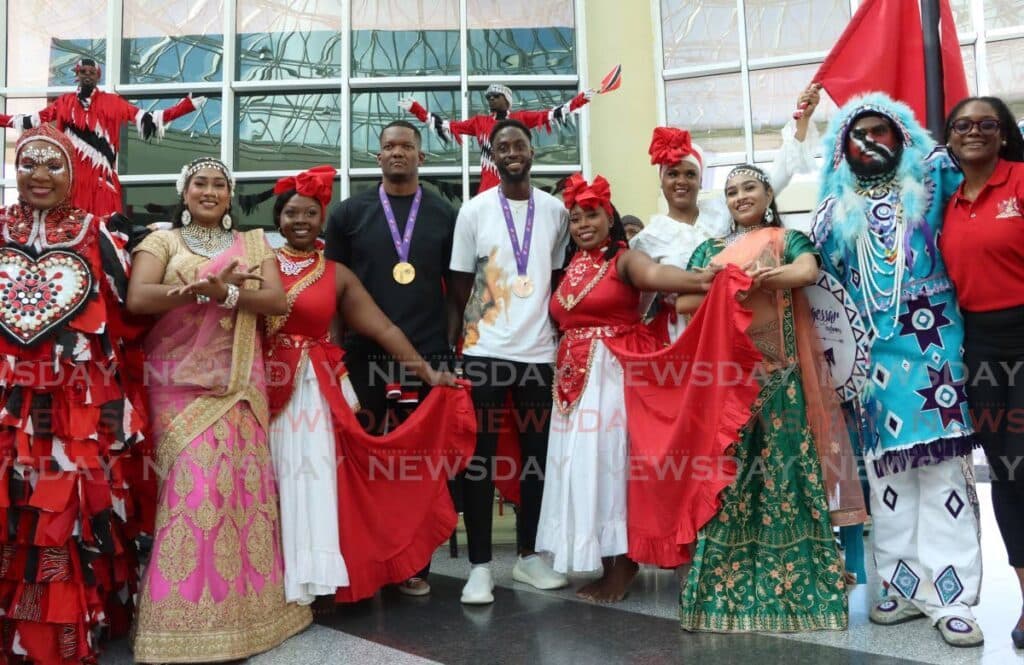 Warm homecoming for World Champions Keshorn, Jereem