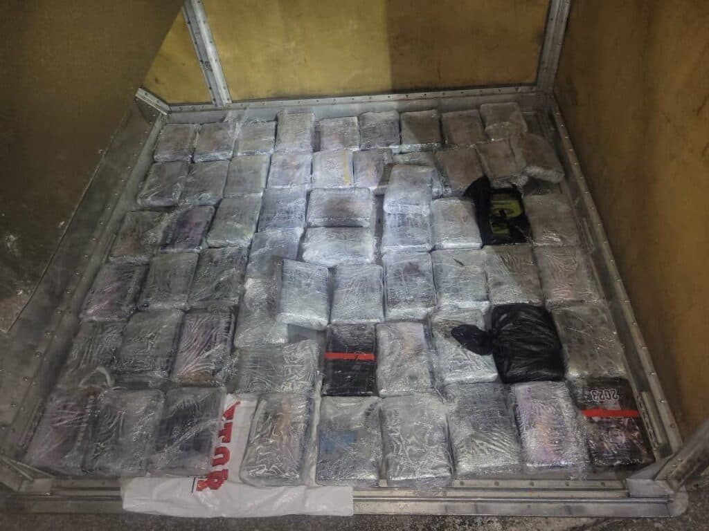 Cops charge two men, one year after $91m cocaine bust