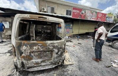 Guyana announces curfew amidst widespread looting, arson