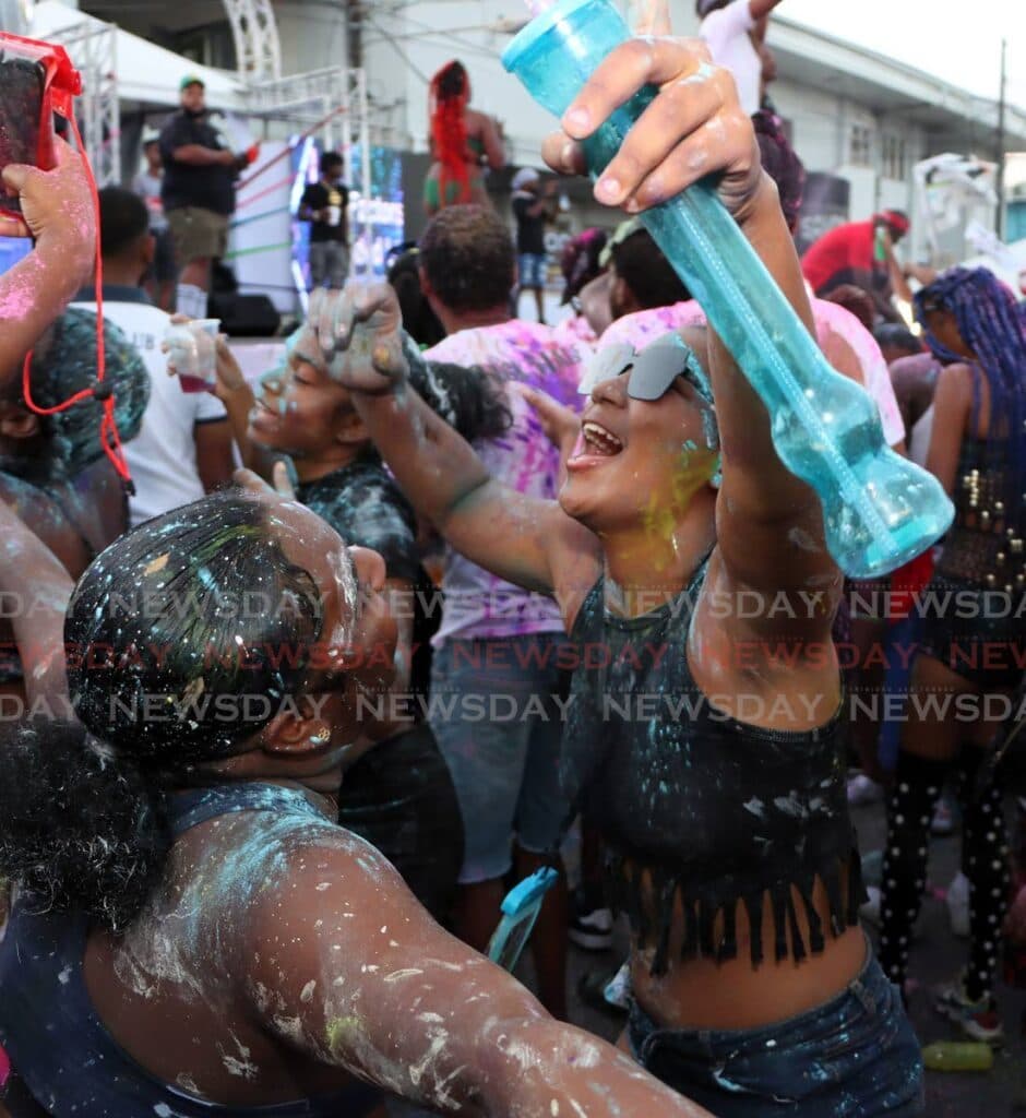 Revellers enjoy J'Ouvert in Mayaro, Sangre Grande