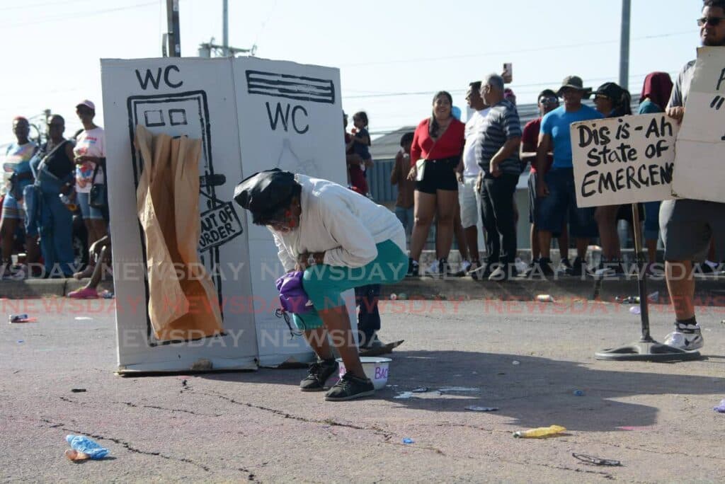 Young's rise to PM, police issues star in San Fernando ole mas