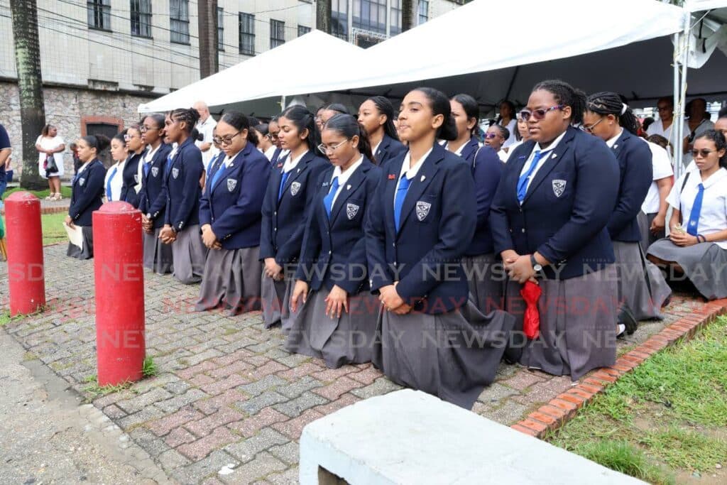 Port of Spain students brave rain for Corpus Christi