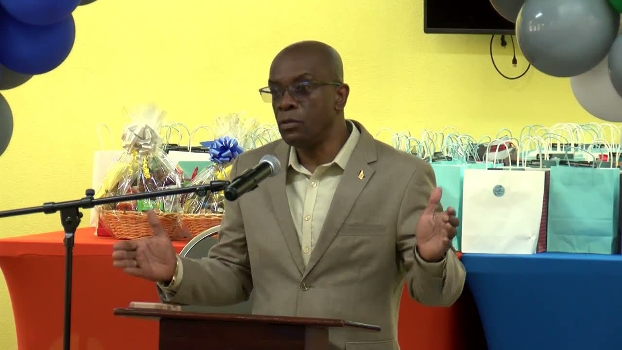 Sports Minister urges fathers to mentor other young men