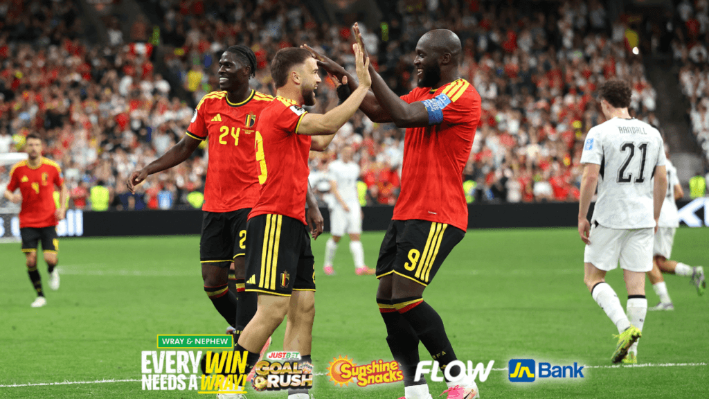 Belgium into World Cup last 32 with New Zealand rout