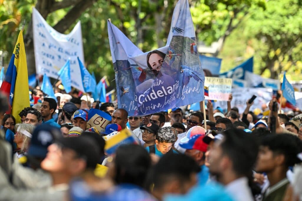 Venezuela’s political camps protest ahead of transition talks